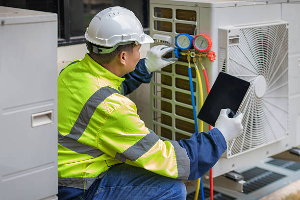 Professional Air Conditioning Repair technician working in Fennville, MI